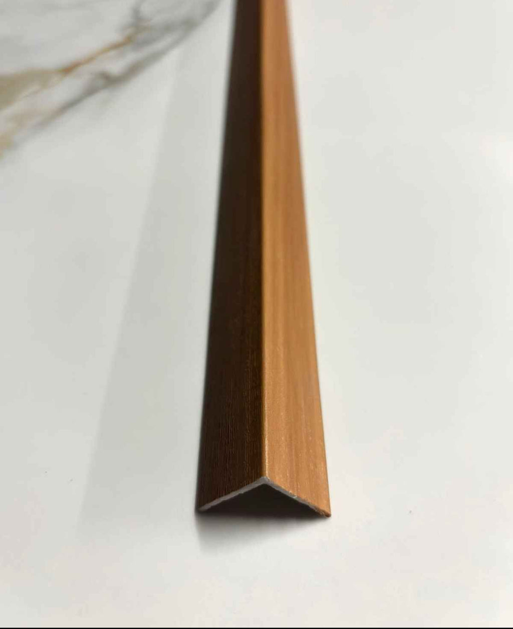 revo surfaces perfil angular pvc interior terra gold 1